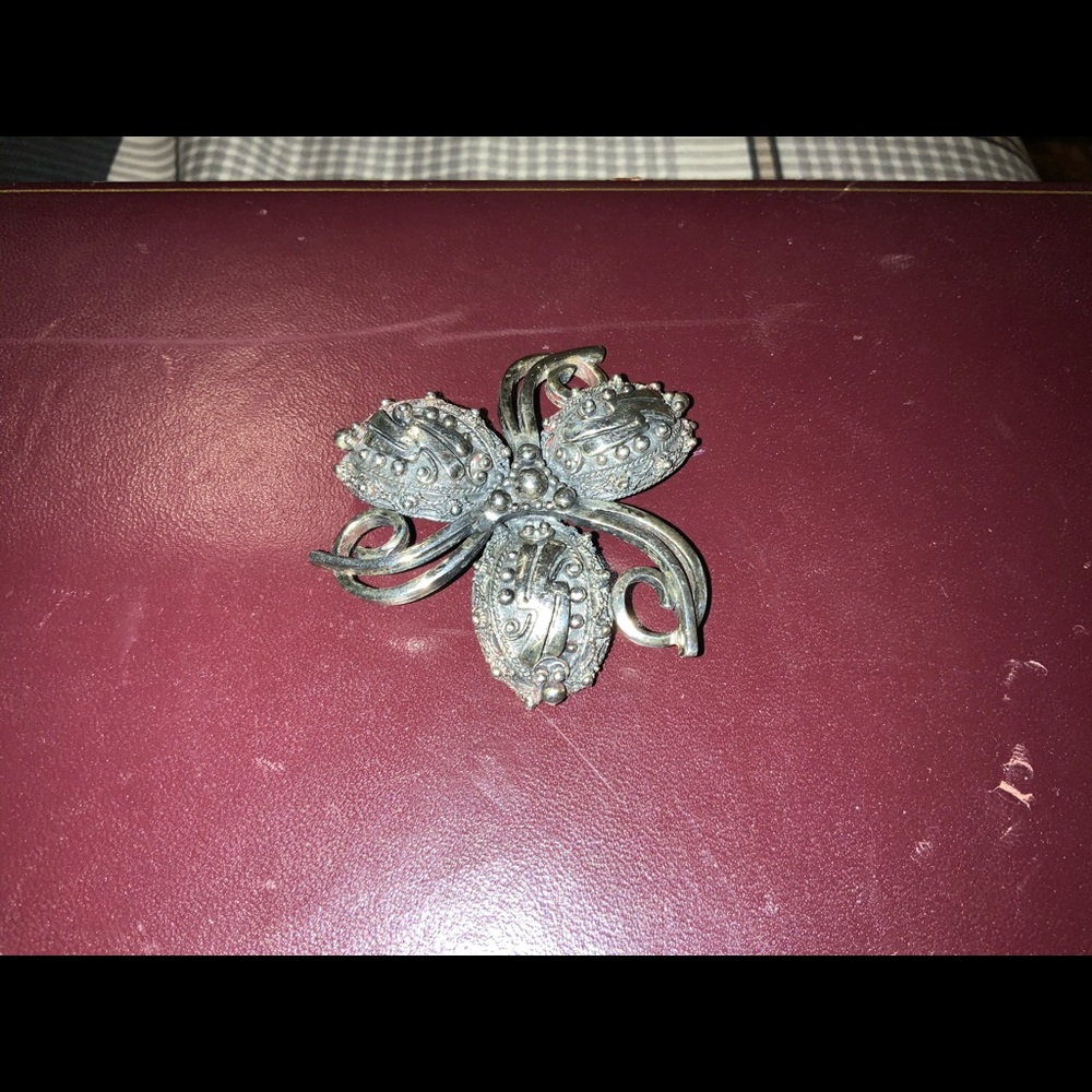 TORTOLANI designer brooch.  2 3/4 in diameter.